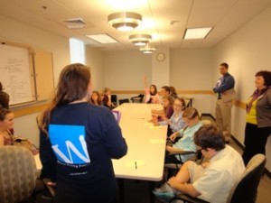 Students in a breakout session during our annual conference discuss tutoring strategies.